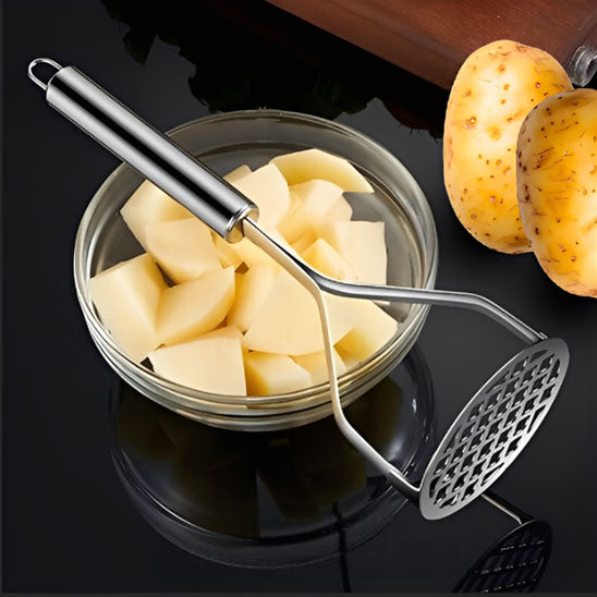 presse-puree-sur-un-bol-en-verre