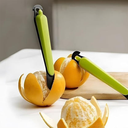 econome-personne-qui-epluche-des-oranges