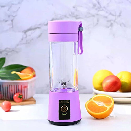 mini-mixeur-mauve-sur-la-table-avec-fruit-autour