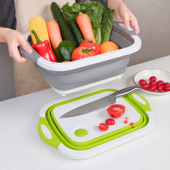 planche-a-decouper-deplier-avec-legume-et-plier-avec-tomate-couper